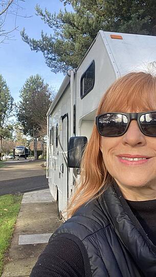 Janice T in front of her Majestic 23a at Sun Outdoors Portland, OR